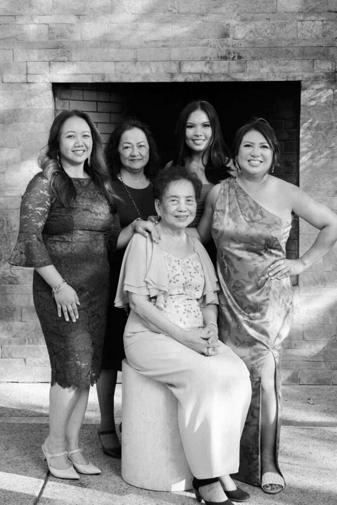 A stylish family posing at the Luxury Portrait Lounge at a bay area wedding