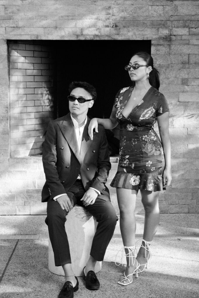 A stylish couple posing at the Luxury Portrait Lounge at a bay area wedding