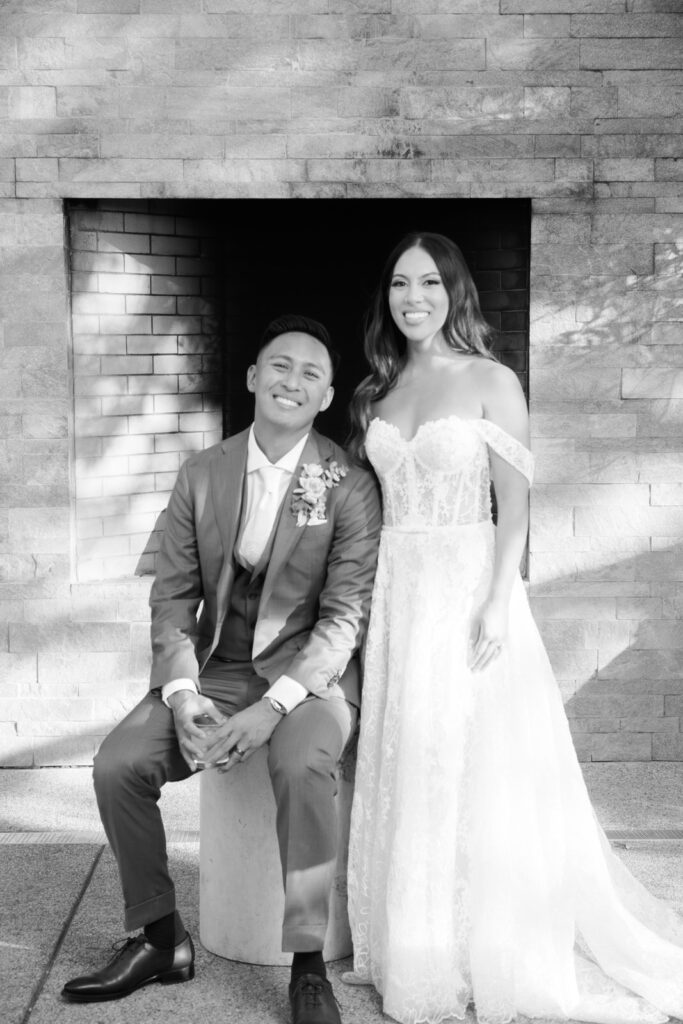 Wedding couple smiling at the bay area photo lounge in Napa