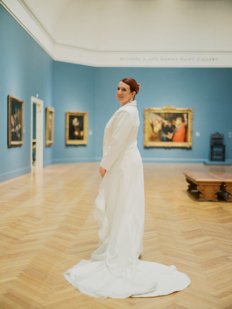 Legion of Honor wedding couple taking pictures inside the galleries 