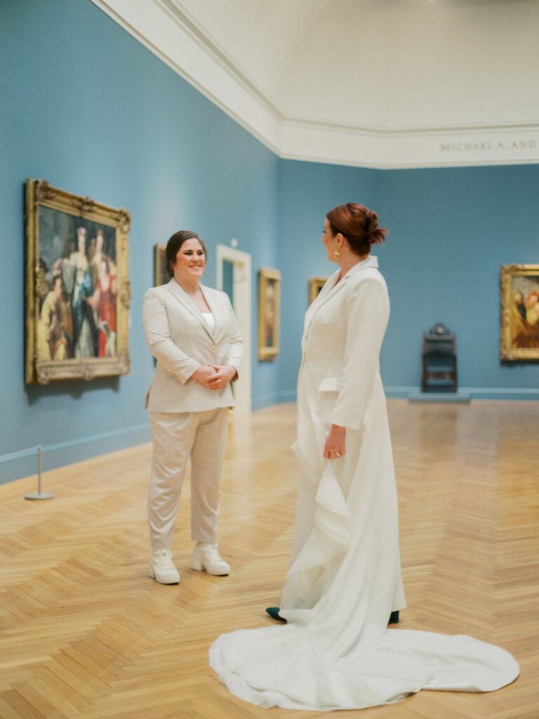 Legion of Honor wedding couple taking pictures inside the galleries 