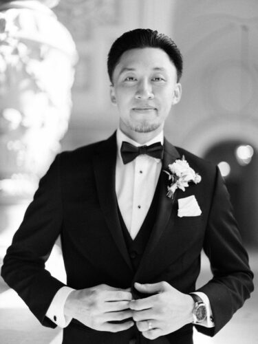 A groomsman poses after his San Francisco city hall wedding