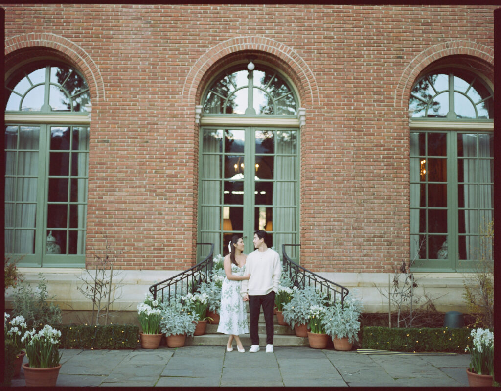 A couple doing their engagement photos at Filoli on 120 film